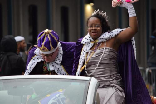 Bayport Parading Society and  Mystic DJ Riders Mardi Gras Parade. Queen and King riding in Parade. Celebrating and throwing beads.
